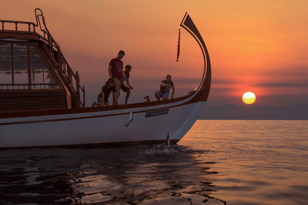 Fisketur ved solnedgang